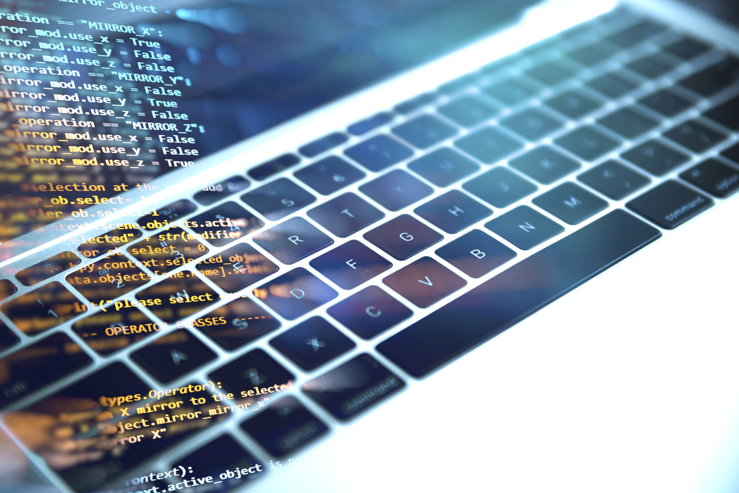 Tela de código e teclado representando análises com SQL